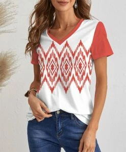 New 👍 IZURIA White & Orange Red Geometric Short-Sleeve V-Neck Top - Plus ⭐