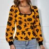 Best Sale 😉 IZURIA Orange & Black Pumpkin Ghost Bishop-Sleeve Scoop Neck Top - Plus ✨