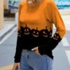 Flash Sale 👏 IZURIA Orange & Black Pumpkin Raglan Contrast-Cuff Long-Sleeve Top - Plus 🤩
